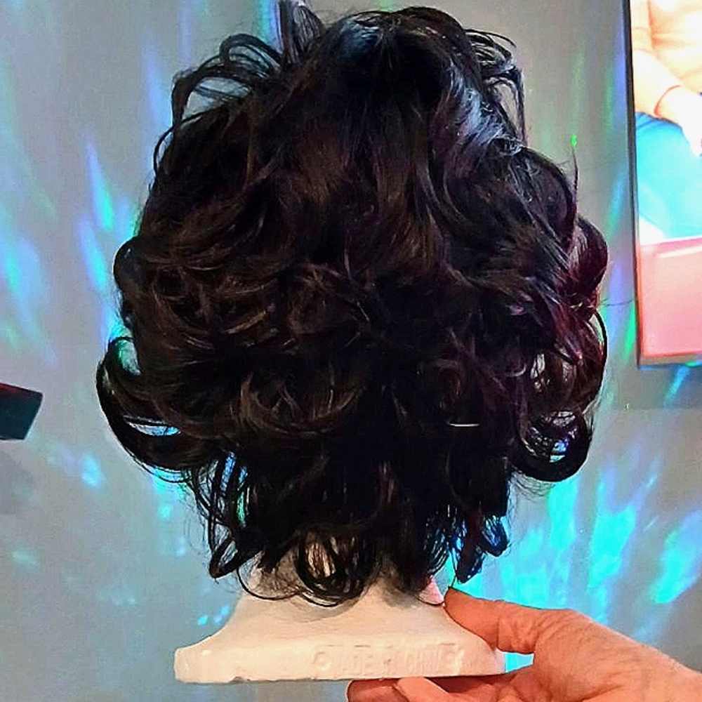 Black synthetic blend high quality wig.